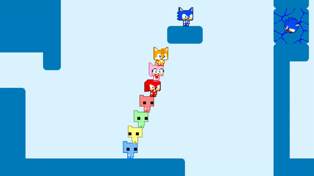 Sonic alcanza una plataforma mientras Tails, Amy, Knuckles y los PICO CAT forman una torre en SONIC PICO PARK